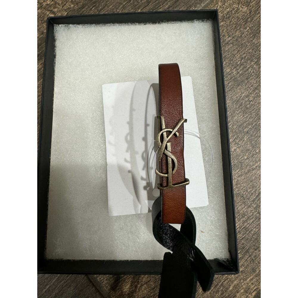 SAINT LAURENT
Cassandre leather and gold-tone bracelet NWT - Picture 6 of 6